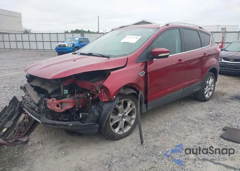 2014 Ford Escape Titanium z USA, uszkodzony, nr VIN 1FMCU0J93EUE07322